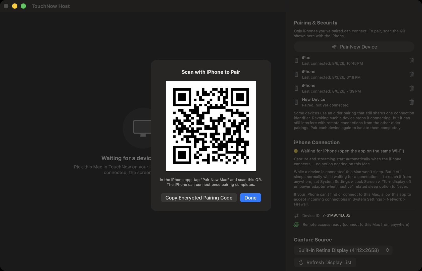 A QR code in the middle of the Mac screen, titled “Scan with iPhone to Pair”.