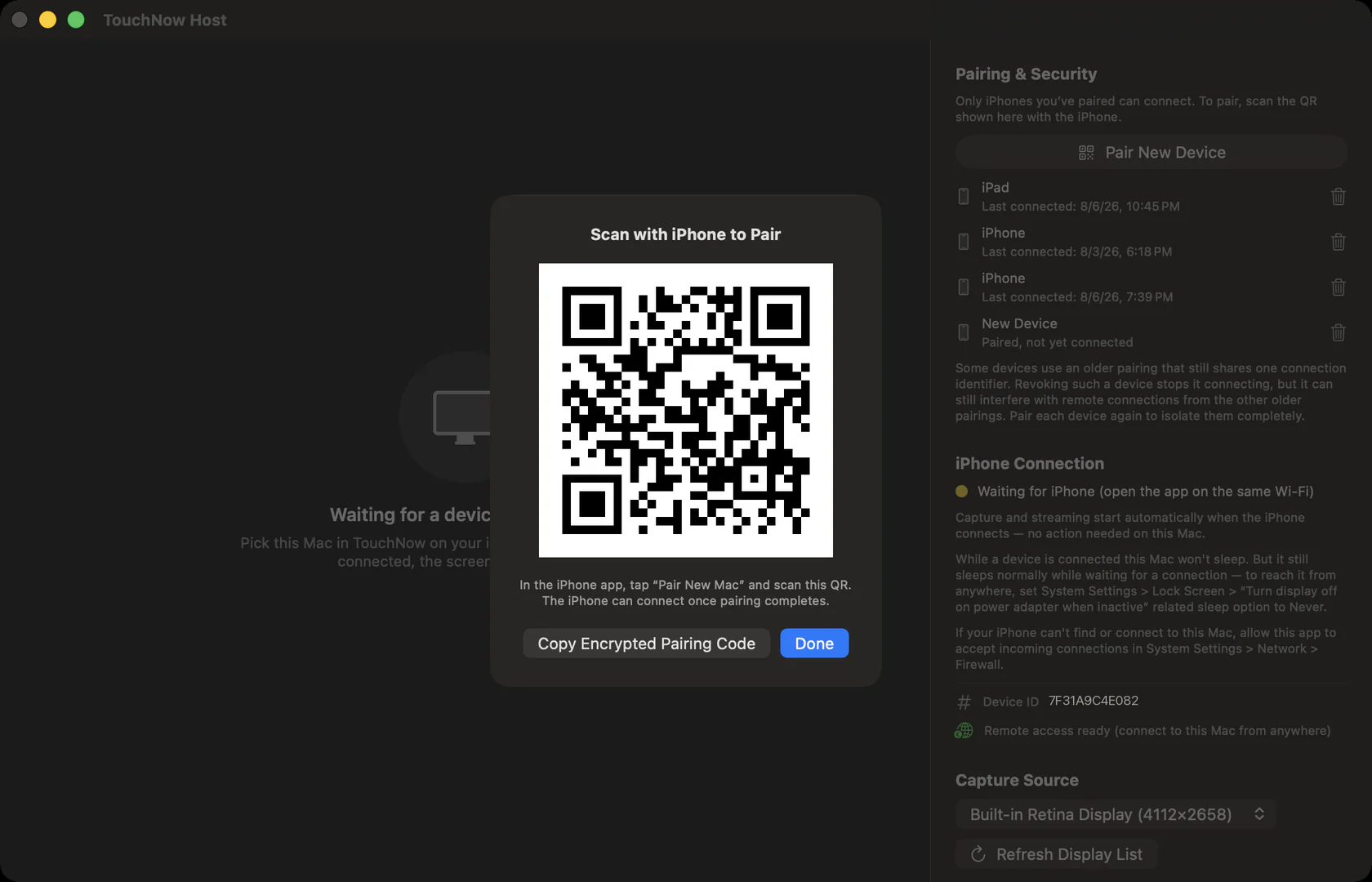 A QR code in the middle of the Mac screen, titled “Scan with iPhone to Pair”.